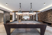 Interior of luxury living room with billiard table