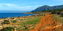 Panorama. Red Dirt Road On The Beach. Cyprus.