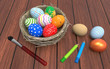 Colorful Easter eggs in a nest on old wood background. 3D Illustration