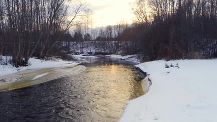 Wall Mural - Sunset at river and forest. Aerial footage. Low altitude. Slow motion.