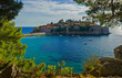 Sveti Stefan island in Budva, Montenegro in the pines frame