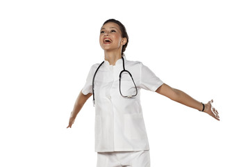 happy young woman doctor on a white background