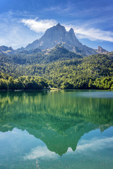 The Pic du Midi d'Ossau, water reflections in a lake, Ossau Valley, Pyrénées, France