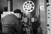 Projectionist At Work In The Room