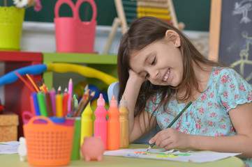 Canvas Print - Little girl drawing at home