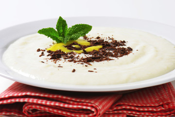 Canvas Print - Semolina porridge with grated chocolate and lemon curd