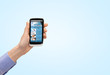 © Syda Productions - close up of hand with news web page on smartphone