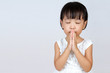 Leinwandbild Motiv Asian Little Chinese Girl Praying