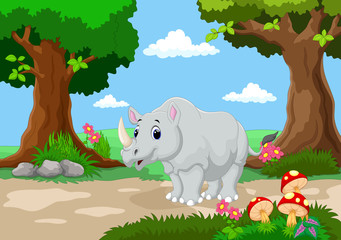 Wall Mural - Funny rhino with a background of a beautiful garden