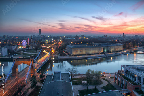 Obraz w ramie WROCLAW, POLAND - APRIL 02, 2016: Aerial view of Wroclaw. Illuminated city skyline during a beautiful sunset, April 02, 2016 in Wroclaw, Poland.