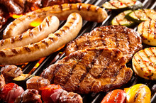 Various Meats And Vegetables On Hot Grill