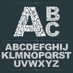 Poster - Set of vector ornate capitals, flower-patterned typescript. Black