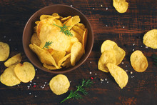 Crispy Potato Chips In A Cup On A Dark Background, Tinted