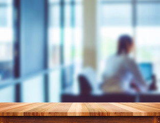 Fototapete - Empty light wood table top with blur office background, Leave sp