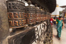Tibetan Prayer Wheels Or Prayer's Rolls Of The Faithful Buddhist
