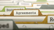 Agreements Concept. Colored Document Folders Sorted for Catalog. Closeup View. Selective Focus. 3D Render.