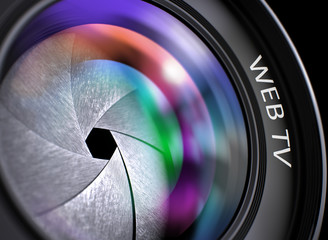 Poster - lens of digital camera with bright colored flares. web tv concept. web tv - text on front of camera 