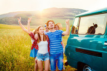 Young Frieds With Campervan, Green Nature And Blue Sky