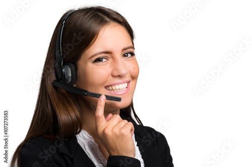 Fotografía Operador de sexo femenino de soporte al cliente con auriculares y sonriente