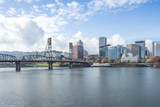 Fototapeta Nowy Jork - tranquil water with cityscape and skyline of portland