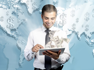 Sticker - Financial concept. Make money on the Internet. Handsome businessman holding tablet on world map background