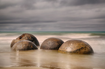 Wall Mural - Moeraki Boulders near Hampden, New Zealand - long time exposure