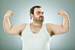 © ZoneCreative - funny fat macho man isolated on grey