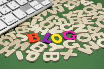 Blog Sign On Green Background With Different Letters And Keyboard