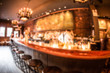 © littleny - Defocused blur of cozy restaurant bar with fisheye effect.