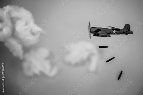 Air Force bombing in the city of the enemy in the world war, Atom bomb drop down from airplane for kill enemy of allied forces Poster