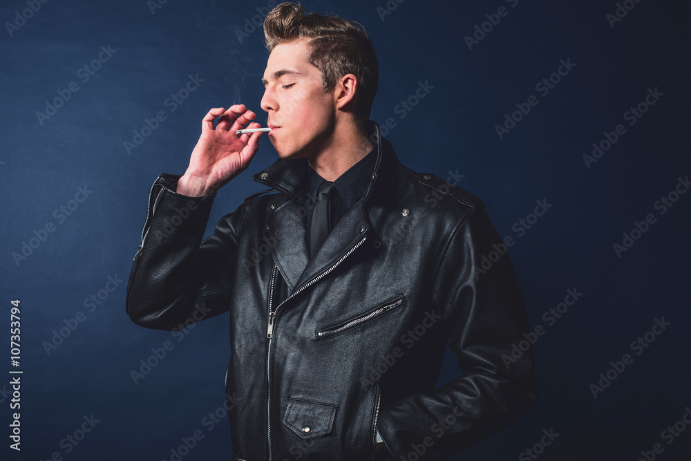 cigarette bl Cigarette smoking retro 50s rock and roll fashion man wearing bl Stock  Photo