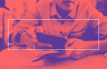 Poster - Empty white frame on Duo tone of woman using mobile phone at res