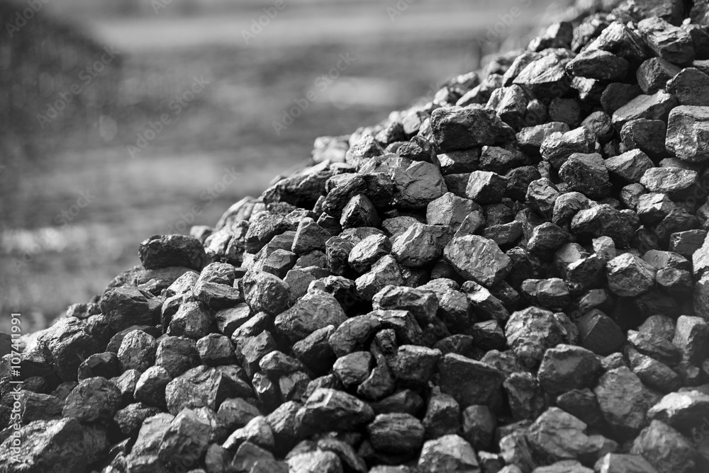 Heap of coal. A place, where coal is stored for selling.
 - obrazy, fototapety, plakaty 