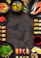 Wall Mural - Sushi and japanese food on dark background