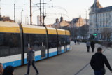 Fototapeta Miasto - Defocused Shot of Tram in Downtown
