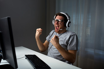 Sticker - man in headset playing computer video game at home