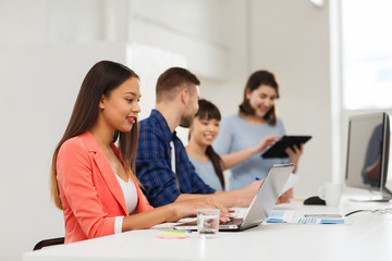 Sticker - happy african woman over creative team at office