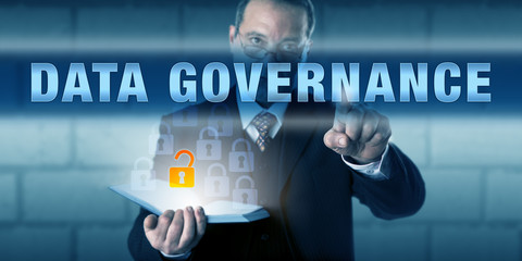 Businessman Pushing DATA GOVERNANCE