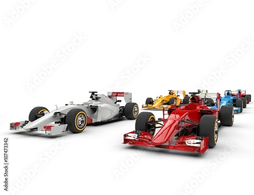 Fotografija Formula one cars - starting positions - isolated on white background