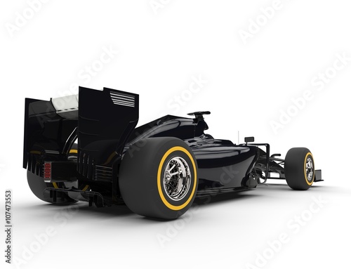 Fotografie, Tablou Black formula one car - tail view - isolated on white background.
