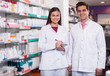 team of pharmaceutist and technician working in chemist shop