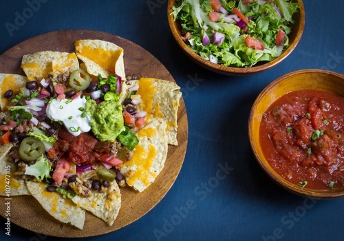 Fényképezés Nacho Cheese Tortilla chips with chili and salsa