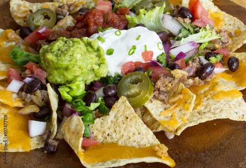 Fényképezés Nacho Cheese Tortilla chips with chili and salsa
