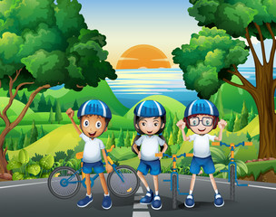 Wall Mural - Three kids and their bikes at the park