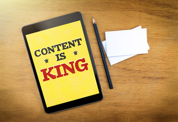 Aufkleber - Content is king on mobile device screen with pen and business ca