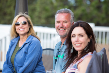 Group of attractive middle-aged friends outside