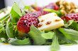 Spring salad with strawberries, rocket salad, parmesan cheese, w