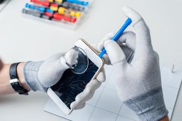 Wall Mural - Close-up photos showing process of mobile phone repair