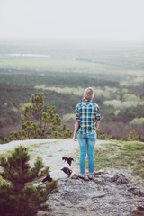 Wall Mural - Woman and her dog posing outdoor. 