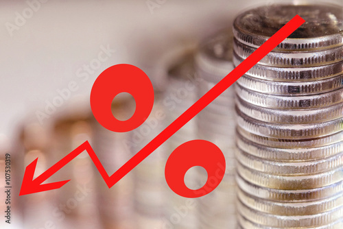 Fotografía Red icon of interest on the background of coins